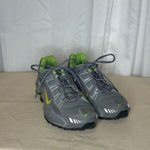 Gray and grey Nike shox